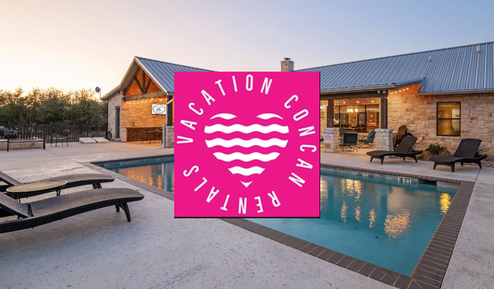 A serene poolside scene at a Texas vacation rental with a modern house in the background in Uvalde County, Texas