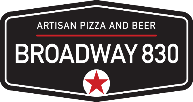A black and red sign advertising Artisan Pizza and Beer at Broadway 830, featuring a red star emblem in Uvalde County, Texas