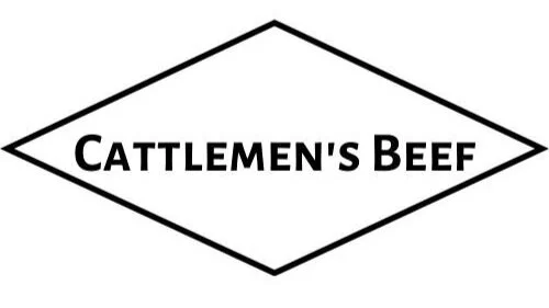A black diamond-shaped logo with the text 'Cattlemen's Beef' inside, representing a brand of beef products in Uvalde County, Texas