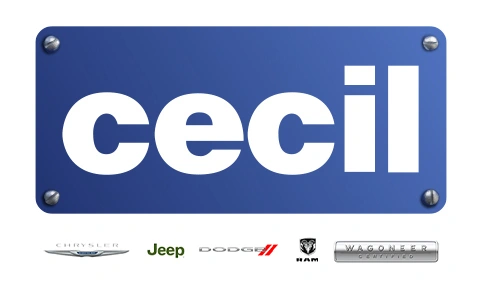 A blue sign with the word 'cecil' in white letters, featuring logos of Chrysler, Jeep, Dodge, and Ram below in Uvalde County, Texas