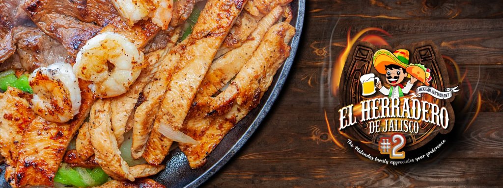 A sizzling skillet filled with grilled steak, shrimp, and chicken fajitas, garnished with peppers and onions, alongside a logo for 'El Herradero' restaurant in Uvalde County, Texas
