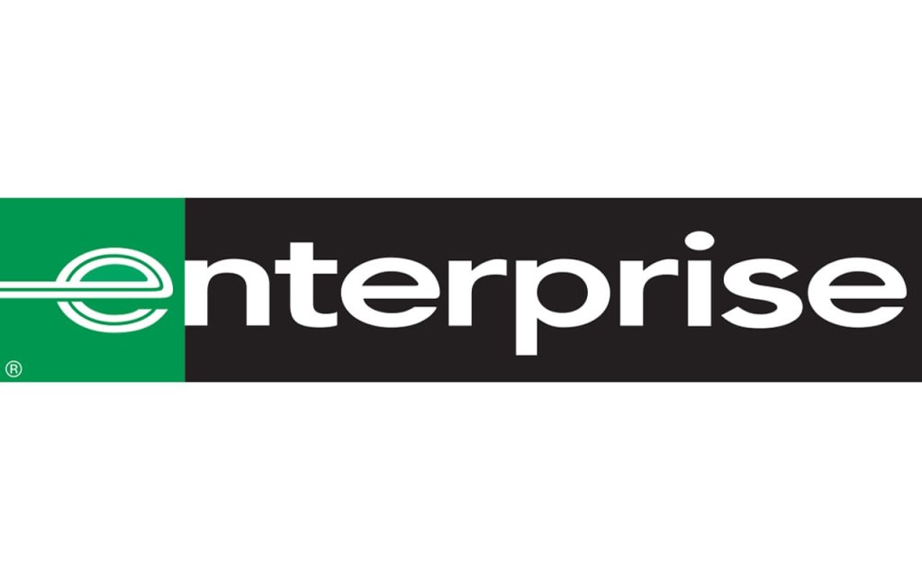 Enterprise Rent-A-Car logo featuring a green and black design with a stylized 'e' and the word 'enterprise' in white text in Uvalde County, Texas
