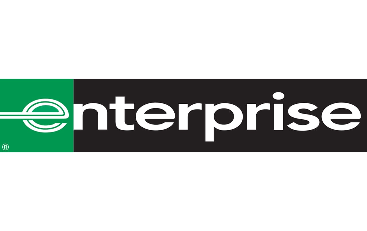 Enterprise Rent-A-Car logo featuring a green and black design with a stylized 'e' and the word 'enterprise' in white text in Uvalde County, Texas