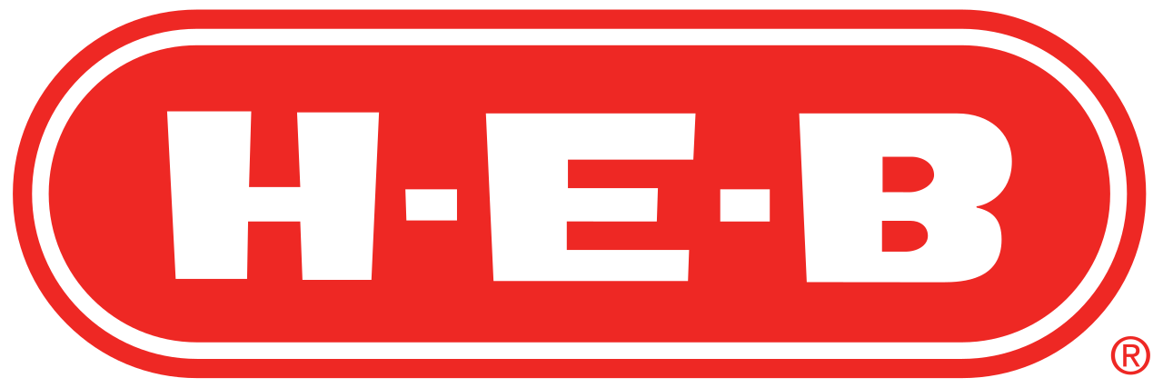 The bright orange logo of H-E-B, a popular supermarket chain in Texas, features bold white lettering within an oval shape in Uvalde County, Texas