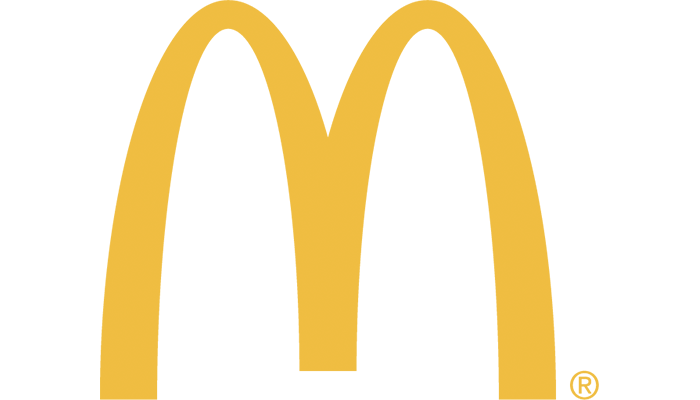 The iconic golden arches of the McDonald's logo, a symbol of the global fast-food chain in Uvalde County, Texas
