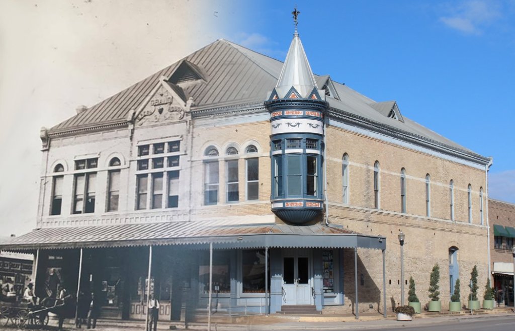 A historic building with a distinctive spire and Victorian architectural details stands on a street corner, juxtaposed against a modern, sepia-toned background in Uvalde County, Texas