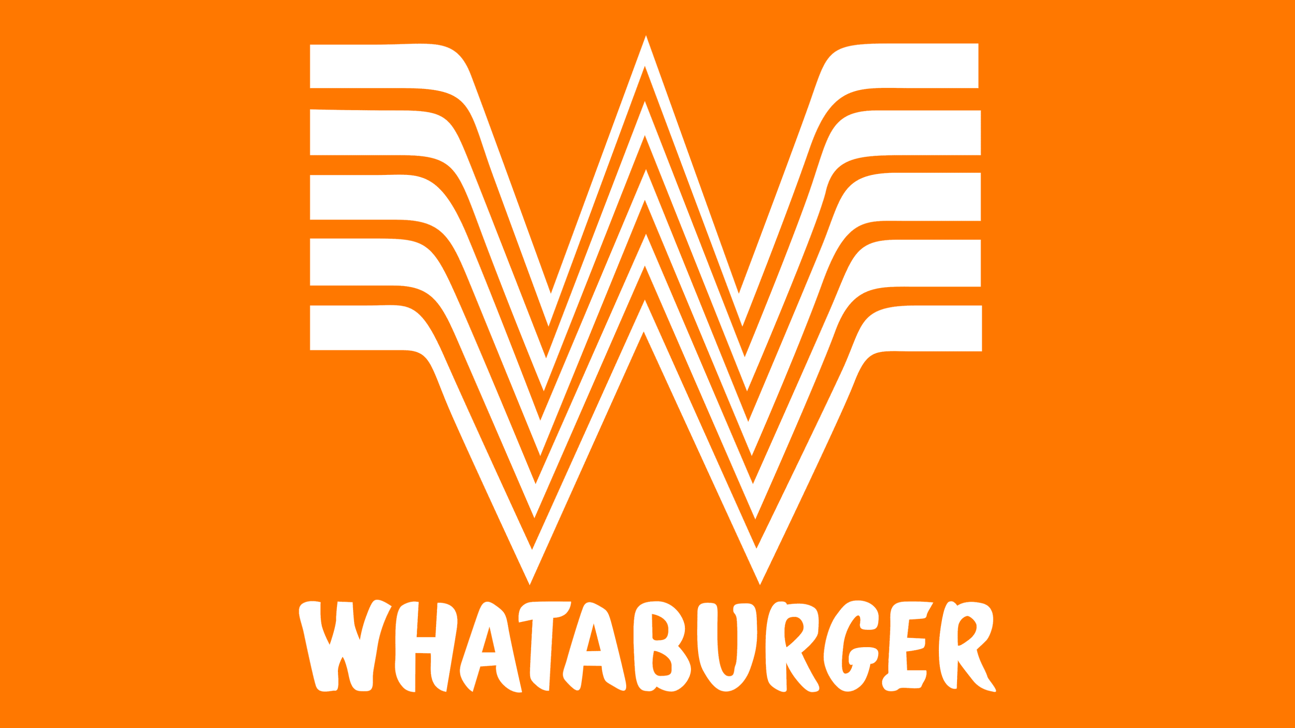The iconic Whataburger logo featuring a stylized 'W' in white against a bright orange background in Uvalde County, Texas