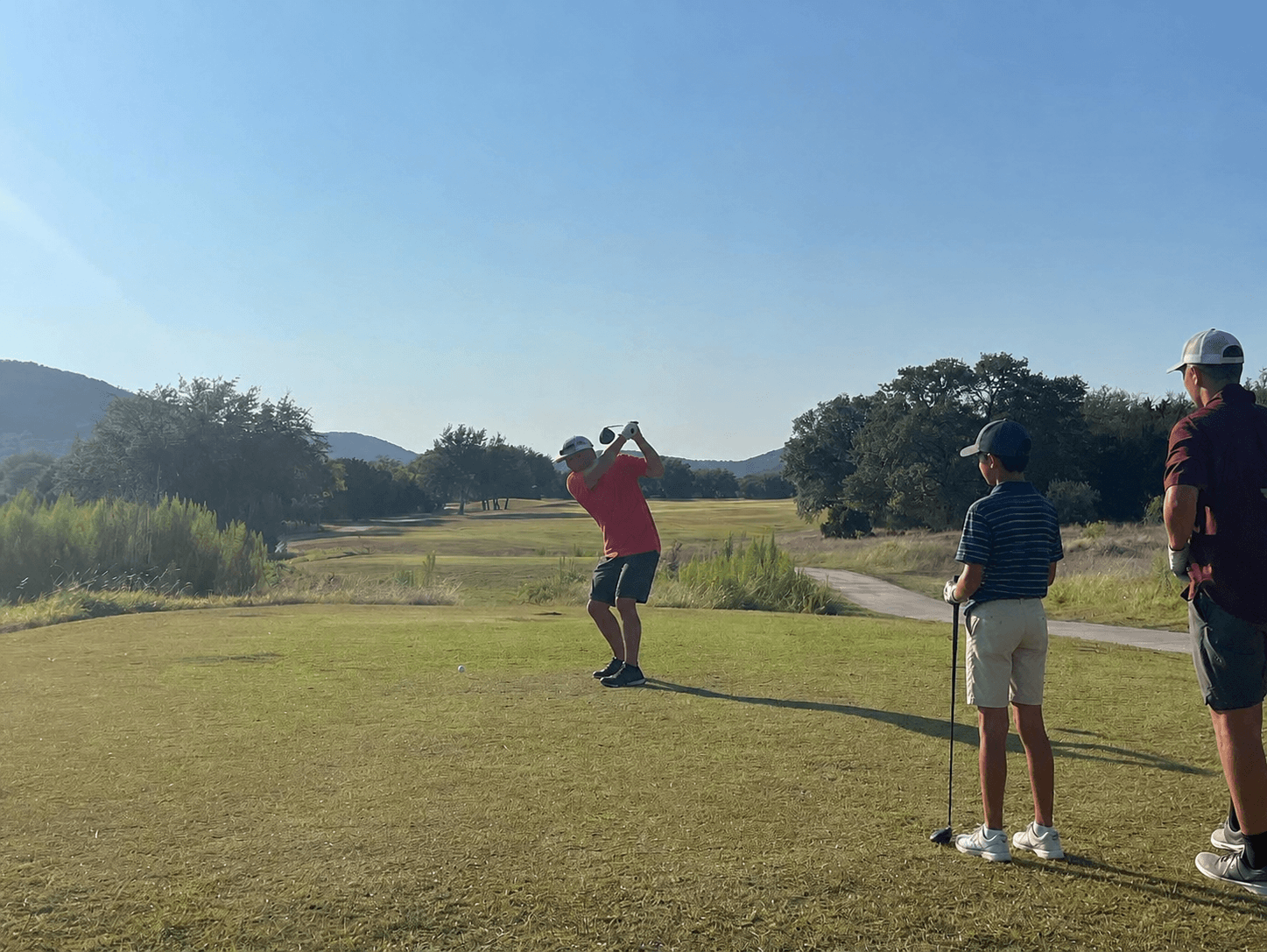 Golf 5 father son golfing e1787676170789